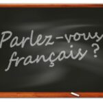Image représentant un tableau noir sur lequel est inscrit "Parlez-vous français?"